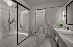 Spacious white marble bathroom
