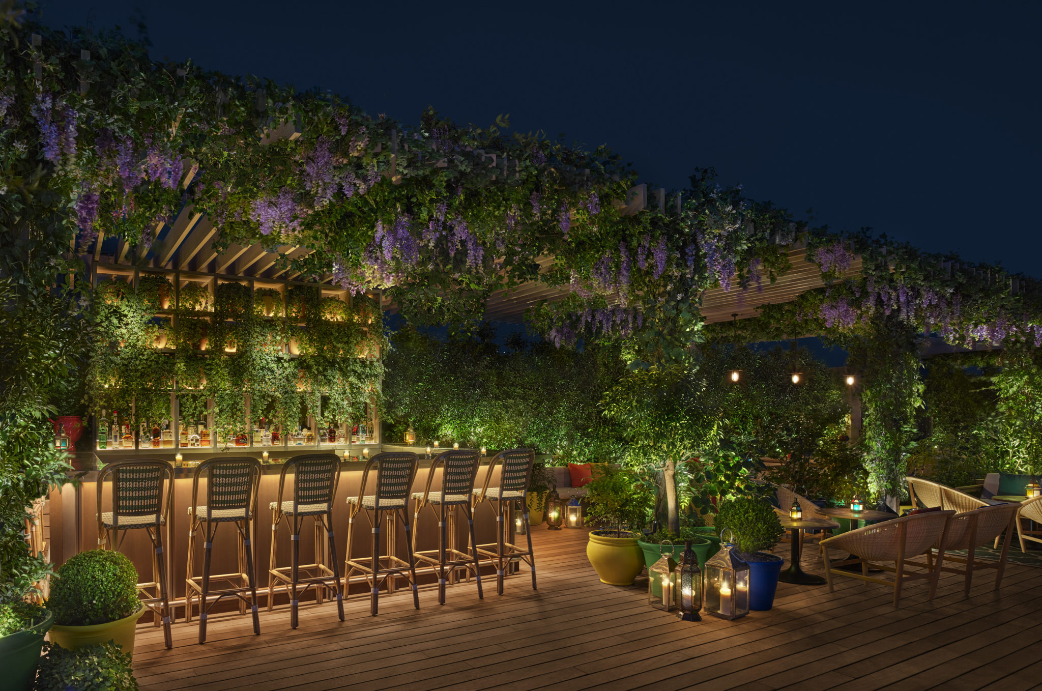 Bar and dining area with hanging garden and potted flora