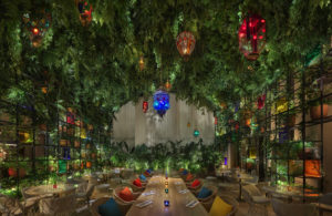 Dining area with hanging garden and colorful lanterns