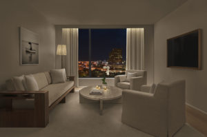 Living room of suite with city view