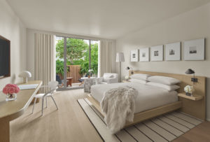 Guest room with fur throw on bed