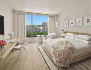 Guest room with fur throw on bed