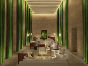 Asientos elegantes en el lobby con cortinas en tonos joya del piso al techo