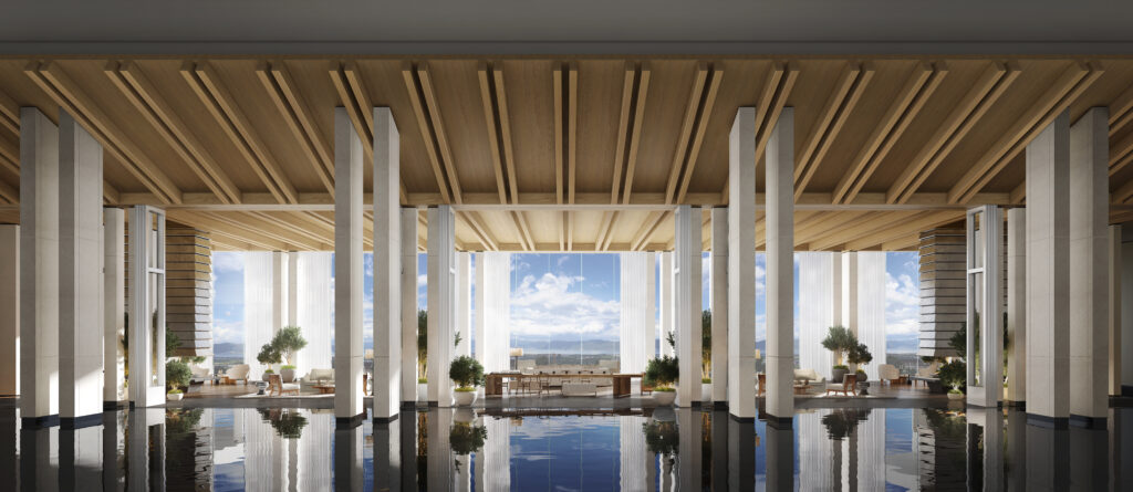 View from lobby with large windows, blue skies and clouds